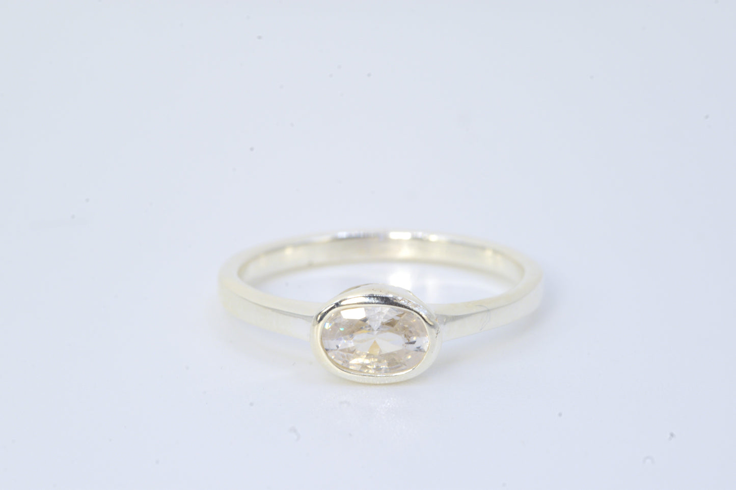 Oval Bezel-Set CZ Ring